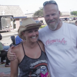 A couple posing for a photo