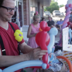 Man making balloon animals