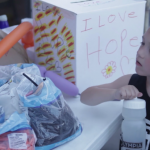 Kid with water bottle